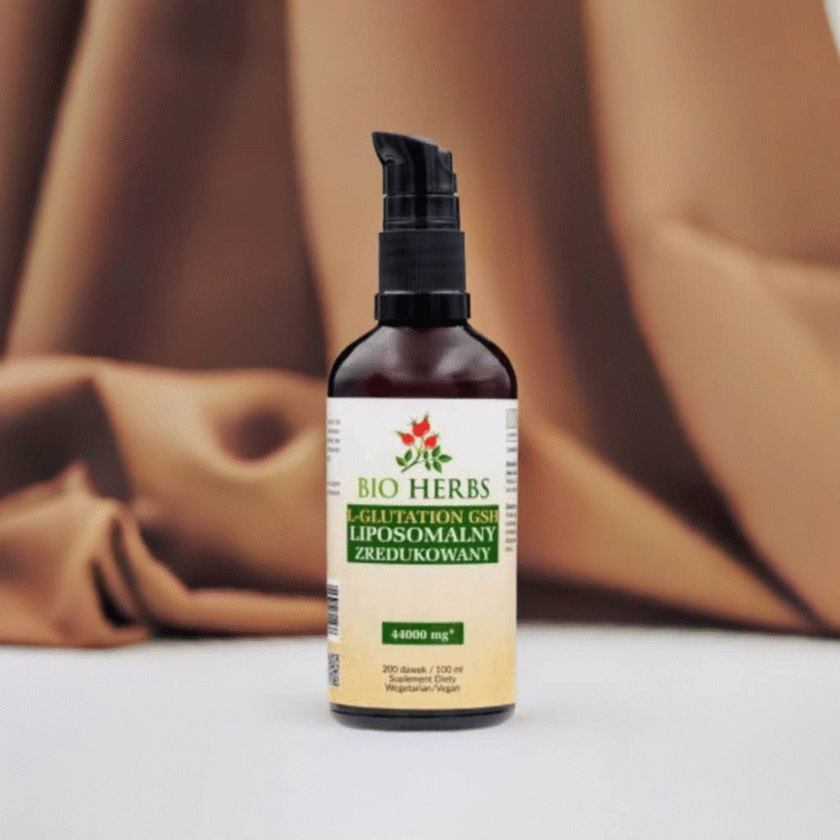 Eco-Herbs L-Glutation GSH Liposomalny Zredukowany 100ml - duża butelka na tle brązowej tkaniny
