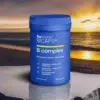 Opakowanie naturalnego suplementu BICAPS B Complex na odporność oraz redukcję zmęczenia chronicznego na tle zachodzącego słońca
