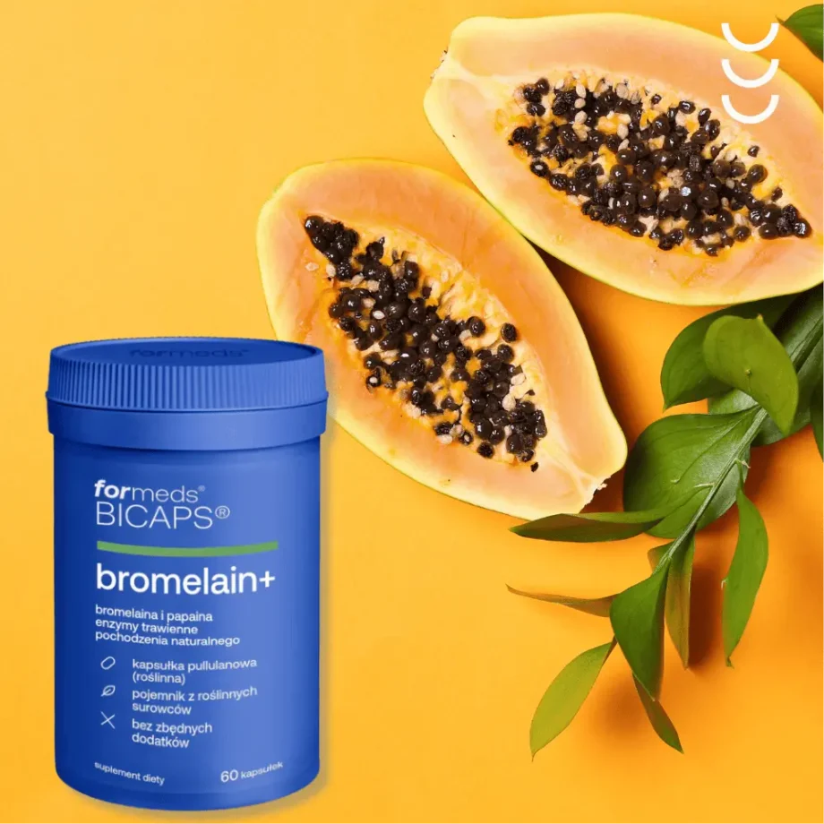 Niebieskie opakowanie bromelain + na tle owoców papaya