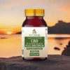 Opakowanie CBD Full Spectrum 10 mg, 100 kapsułek z optymalną dawką kannabinoidów ,a tle zachodzącego słońca