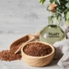 Butelka ekologicznego oleju lnianego z elementami nasion konopi - suplement diety na zdrową skórę i włosy