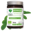 Brązowe opakowanie metabolizm moringa na tle moringi