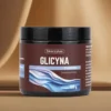 Opakowanie suplementu Skoczylas Glicyna + Tryptofan 100g na brązowym tle