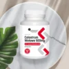 Colostrum Aliness wołowe - naturalne wsparcie odporności i regeneracji, opakowanie na tle marmurowej podstawki