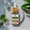 Kozłek Lekarski krople Bio-Herbs - płynny ekstrakt ziołowy na marmurowym blacie z zielonym liściem symbolizującym naturalne pochodzenie